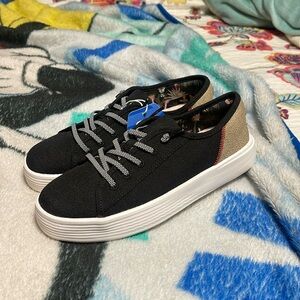 Never worn women’s size 8 Hey Dude tennis shoes